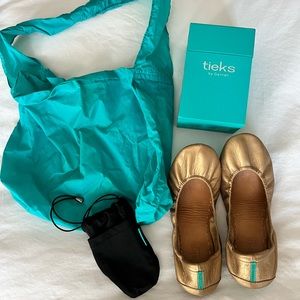Metallic Gold Tieks in Size 8. Only worn a couple of times. Great condition.